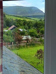 a view from the roof of a house at River Black Water inn in Garve +8 photos