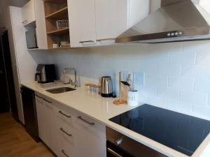 a kitchen with a sink and a counter top at 212 The Meadows in George