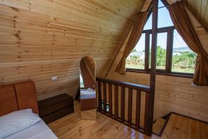 Postel nebo postele na pokoji v ubytování Cottage Hamaki Pool & Spa - Bazaleti Lake