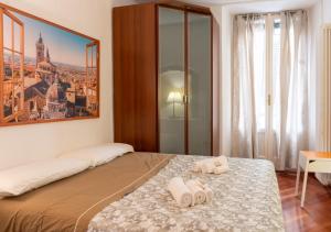 Ένα ή περισσότερα κρεβάτια σε δωμάτιο στο Bergamo Alta - Charm & History