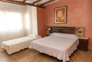 Ένα ή περισσότερα κρεβάτια σε δωμάτιο στο Hostal Welcome2 Alcázar
