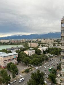 an aerial view of a city with a parking lot at Панорамная евродвушка комфорт-класса in Almaty