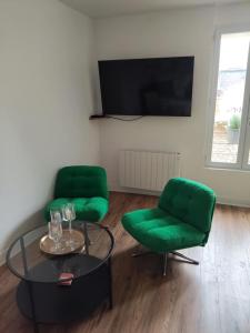 TV a/nebo společenská místnost v ubytování Papillon Dieppois by HOLIDIEPPE + 19 fotografií