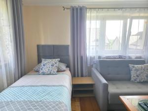 Postel nebo postele na pokoji v ubytování Matylda House