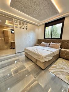 Una cama o camas en una habitación de Villa Atlas