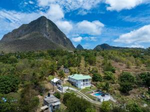 an aerial view of a villa with a mountain in the background at Piton star villa in Choiseul