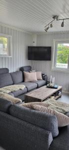 Posezení v ubytování Cottage in Hellesøy, Øygarden