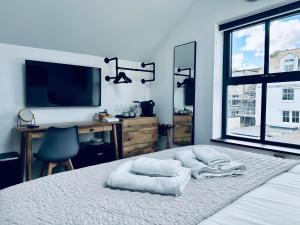 Uno in the City - Luxury Serviced Accommodation客房内的一张或多张床位