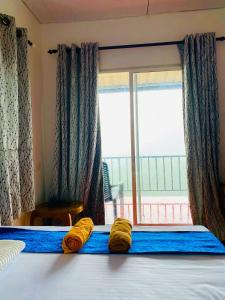 Giường trong phòng chung tại Nature Dreams Homestay & Restaurant
