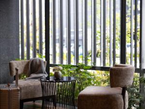 Гостиная зона в Mitsui Garden Hotel Fukuoka Nakasu +50 фотографий