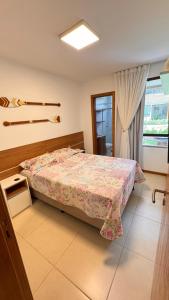 Ένα ή περισσότερα κρεβάτια σε δωμάτιο στο Itacimirim Village Bioflora Impecável Novo +41 φωτογραφίες