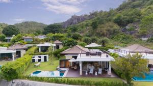 an aerial view of a house with a swimming pool at Ocean View Japandi Sauna & Rooftop 3BR Pool Villa in Khao Tao