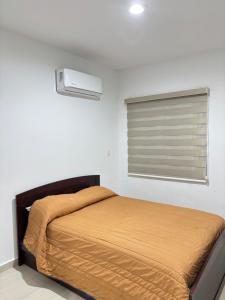 Postel nebo postele na pokoji v ubytování Almarena Residencial + 8 fotografií