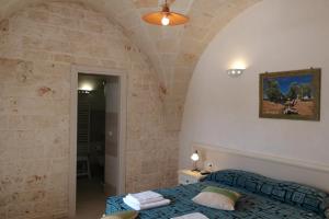 Posteľ alebo postele v izbe v ubytovaní B&B Demetra