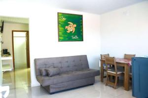 Ruang duduk di Recanto das Tartarugas Flats
