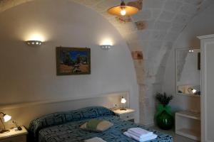 Posteľ alebo postele v izbe v ubytovaní B&B Demetra