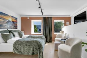 Postel nebo postele na pokoji v ubytování Bramy Apartments Retreat