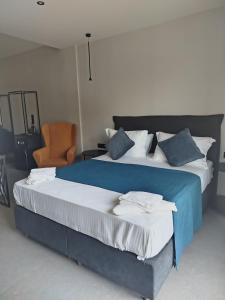 Katil atau katil-katil dalam bilik di HOTEL ANDREAS