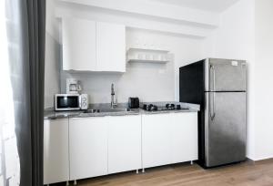 Una cocina o cocineta en Nice apartment with pool