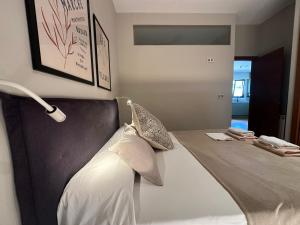 Ένα ή περισσότερα κρεβάτια σε δωμάτιο στο Apartamento Sta Cruz 2 Dormitorios