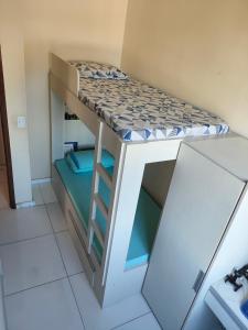 Voodi või voodid majutusasutuse Cobertura Pampulha toas