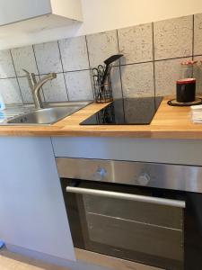 Η κουζίνα ή μικρή κουζίνα στο Magnifique Appartement T2 situé en Hyper centre +15 φωτογραφίες