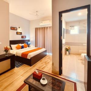 Letto o letti in una camera di The Ruby Resort, Vrindavan #prime location #luxury rooms #near prem mandir #restaurant #big lawn #parking