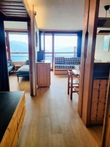 a living room with a view of the ocean at Résidence Nova 3 - Appartement 2 pièces 6 personnes proche des pistes MAE-8014 in Arc 1800