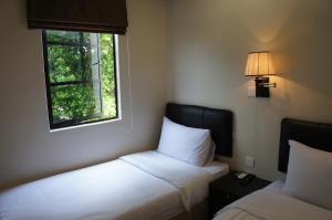 Postel nebo postele na pokoji v ubytování Hotel Hong