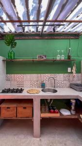 Kuchyň nebo kuchyňský kout v ubytování Villa Serena Comfort Suites