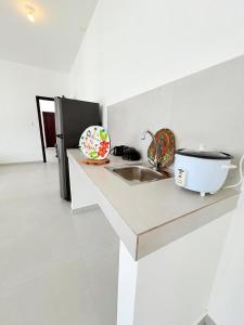 Kuchyň nebo kuchyňský kout v ubytování Marina Suite