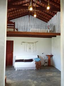 Ένα ή περισσότερα κρεβάτια σε δωμάτιο στο Casa mahalo atalaia wi-fi