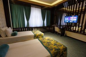 Dashli Gala Hotel Ganja客房内的一张或多张床位