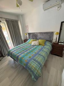 Giường trong phòng chung tại Urbanización Hoyo 4