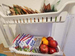 a refrigerator filled with food and fruits and drinks at Private Cozy Room and Bathroom in Home near Seaworld Riverwalk and AFB in San Antonio +8 photos