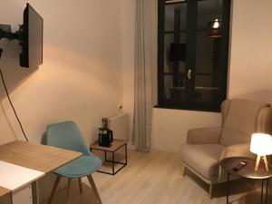 Χώρος καθιστικού στο Chambre Cosy 1