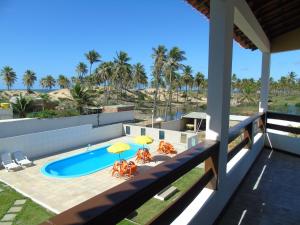 En terrasse eller udendørsområde på Pousada Solar Da Lagoa - Baixio BA