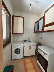 Køkken eller tekøkken på Villa Rosa Apartment