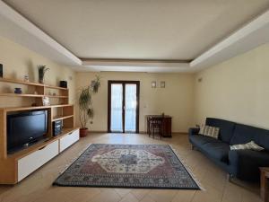 Et tv og/eller underholdning på Villa Rosa Apartment