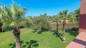 Сад в Hoyo 1 Apartamento Deluxe penthouse golf con piscina