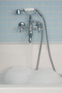 Koupelna v ubytování Numero cent