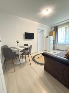 TV a/nebo společenská místnost v ubytování Apartament 2 camere