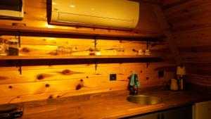 Kuchyň nebo kuchyňský kout v ubytování Dreamy Life Bungalow