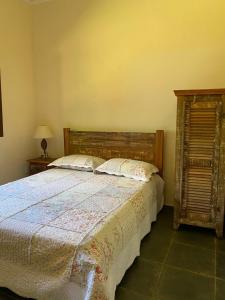 Postel nebo postele na pokoji v ubytování Refúgio Mó de Pedra