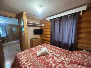 Postel nebo postele na pokoji v ubytování Lac Des Roches Resort