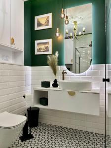 Koupelna v ubytování Apartament Filmowy za Ratuszem + 7 fotografií