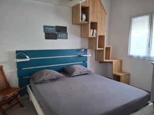 Katil atau katil-katil dalam bilik di Appartement neuf a 150 metres de la mer wifi