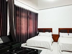 Katil atau katil-katil dalam bilik di Hotel Green View near Sarangan Lake RedPartner
