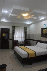 Postel nebo postele na pokoji v ubytování HOANG THANH THUY BÀ RỊA - VŨNG TÀU HOTEl 3 + 28 fotografií