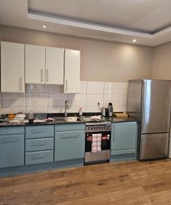 Kuchyň nebo kuchyňský kout v ubytování Appartement deluxe, chic et familiale